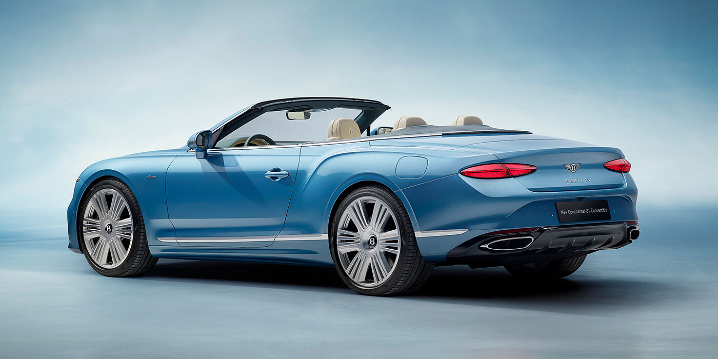 Bentley Madrid New Bentley Continental GTC Azure convertible rear view in Light Windsor blue paint with 22 inch ten spoke wheels and chrome exterior details