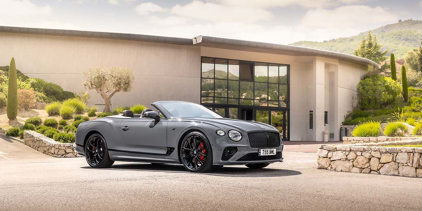 Bentley Madrid Bentley Continental GTC S convertible in Cambrian Grey paint front 34 static near house
