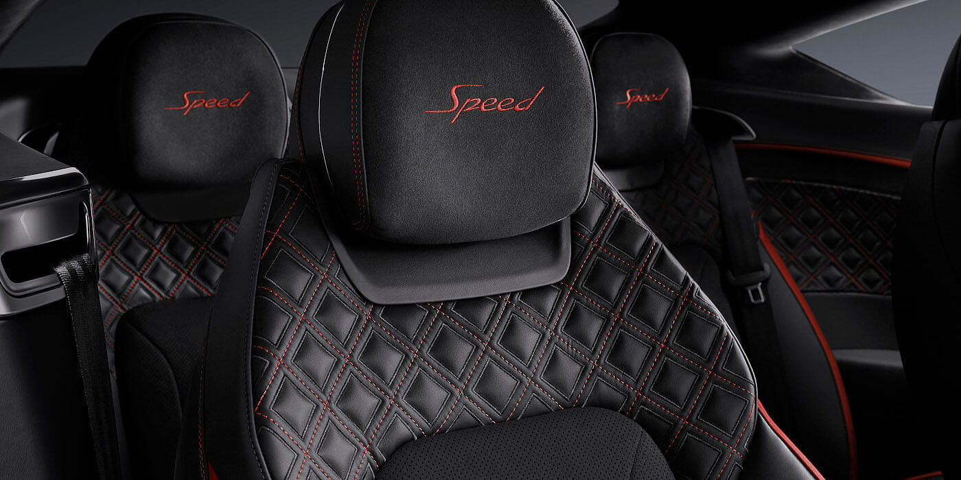 Bentley Madrid Bentley Continental GT Speed coupe seat close up in Beluga black and Hotspur red hide