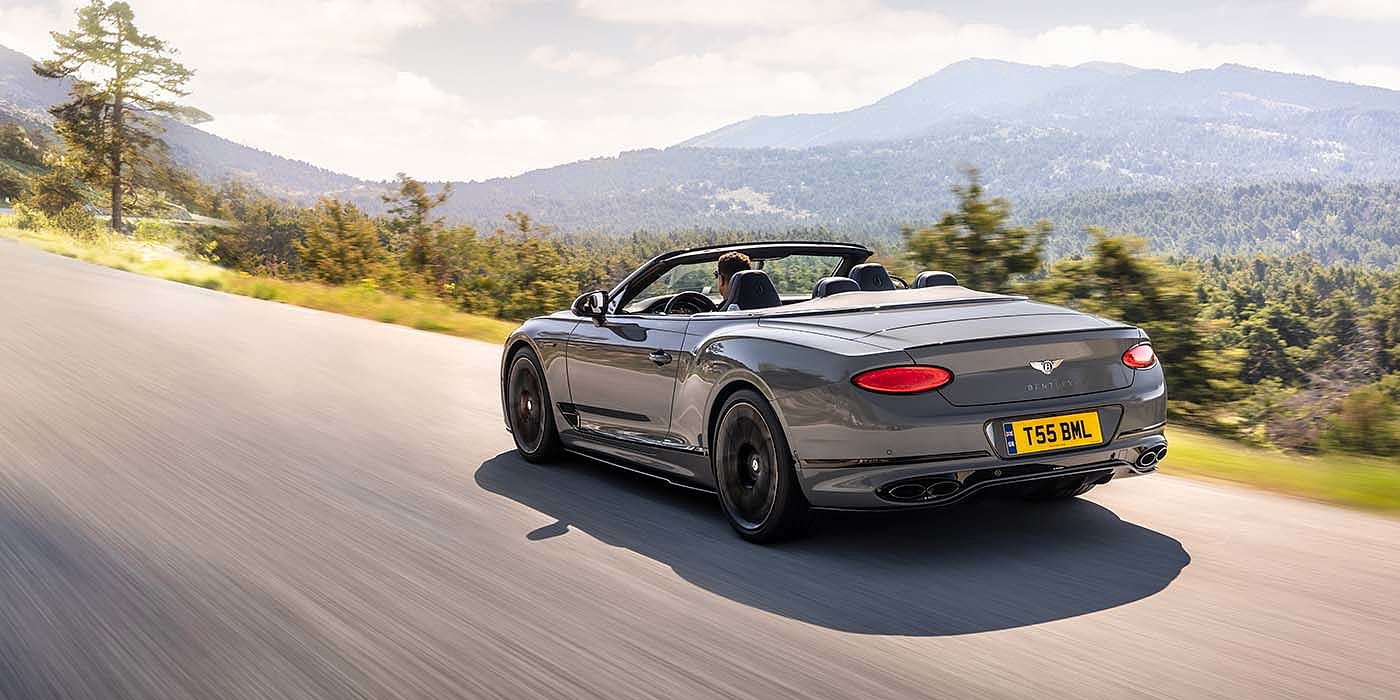 Bentley Madrid Bentley Continental GTC S convertible in Cambrian Grey paint rear 34 dynamic driving