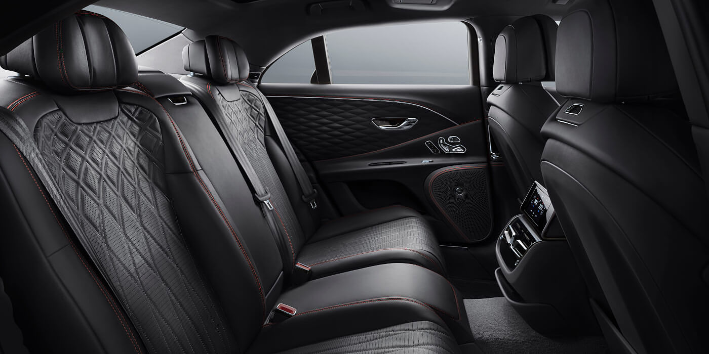 new-Bentley-Flying-Spur-V8-rear-interior-in-Beluga-black-quilted-leather