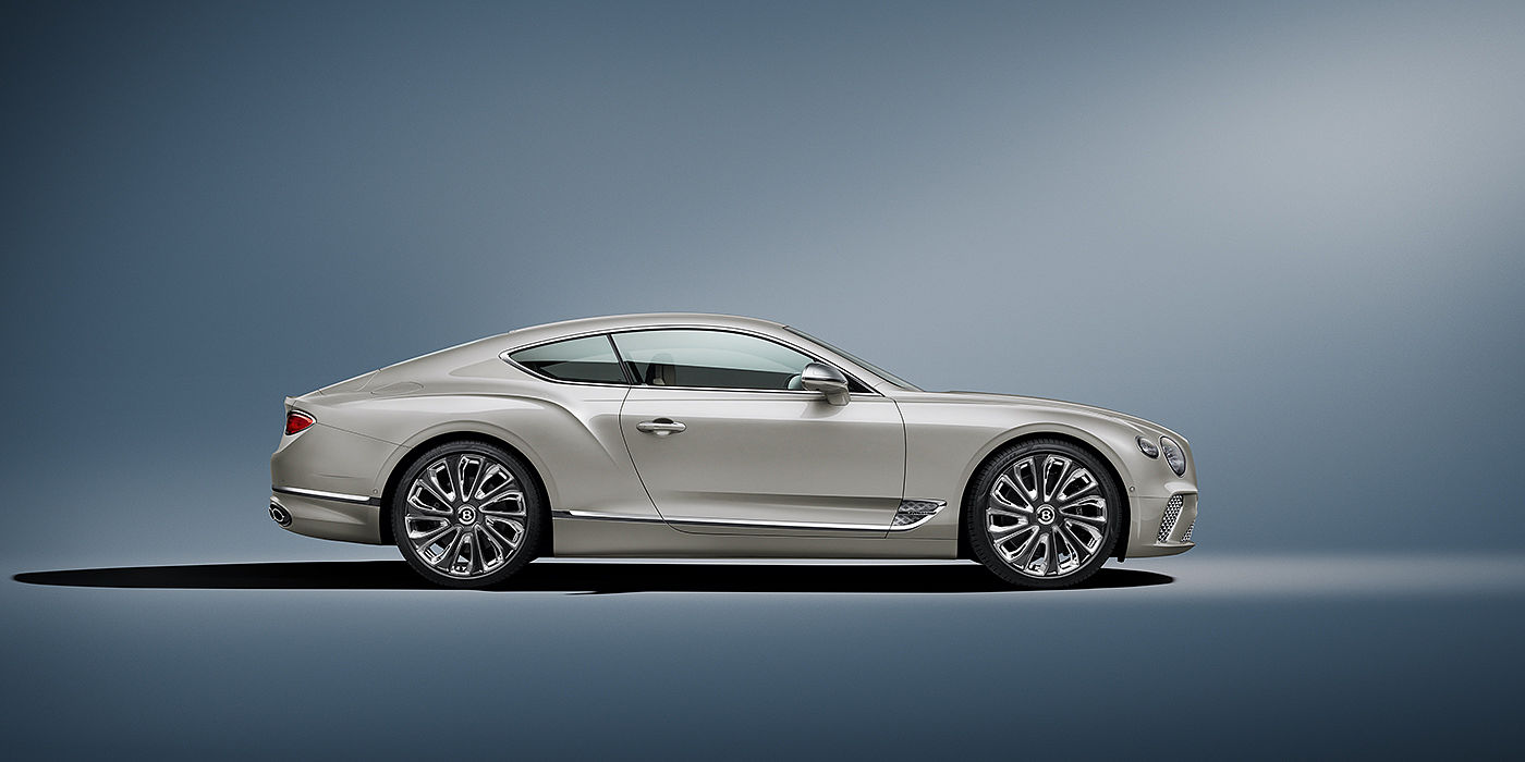 Bentley Madrid Bentley Continental GT Mulliner coupe in White Sand paint front 34