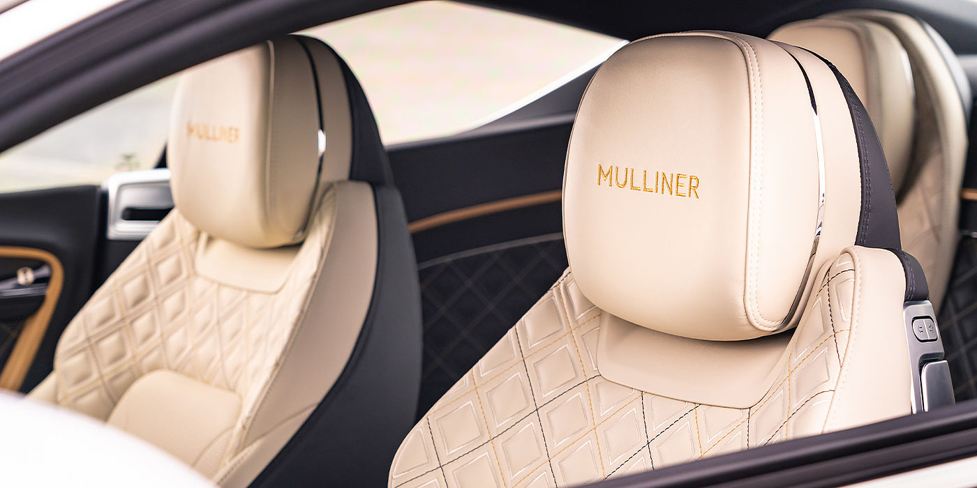 Bentley Madrid Bentley Continental GT Mulliner coupe seat detail in Beluga black and Linen hide