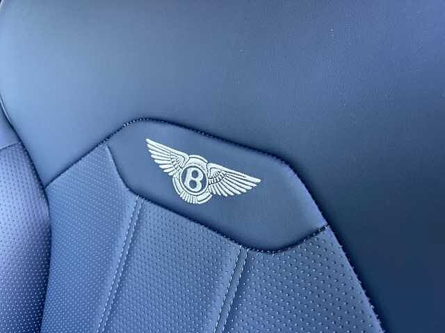 18:Bentley Bentayga, SUV, Black Sapphire over Sequin Blue, Bentley Madrid