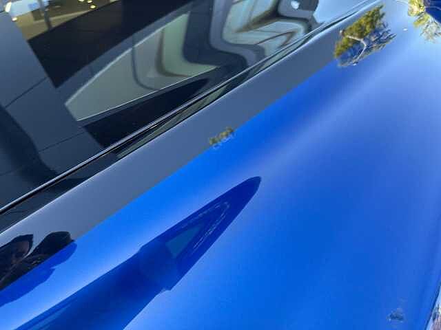 13:Bentley Bentayga, SUV, Black Sapphire over Sequin Blue, Bentley Madrid